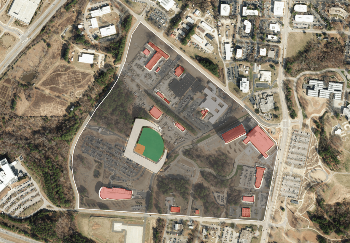 A to-scale ballpark dropped onto the Reedy Creek Road parcel, with parking and existing buildings mapped around it